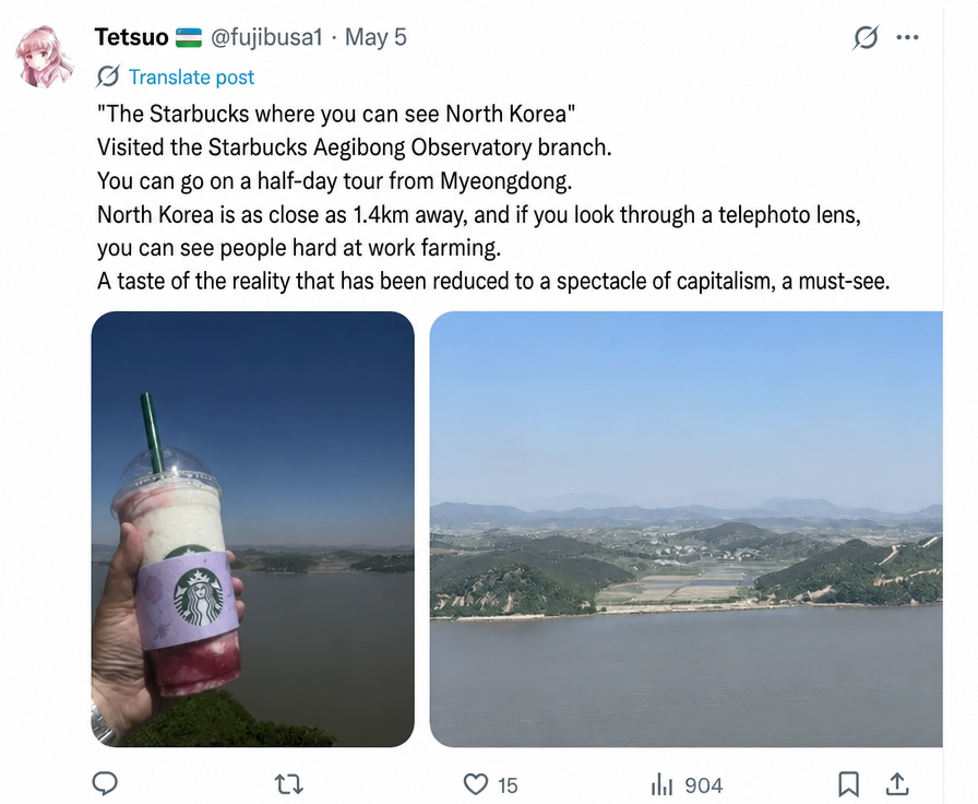 A screenshot of a Japanese tourist's tweet taken at an observatory with a view of North Korea and the river, holding a Starbucks drink.