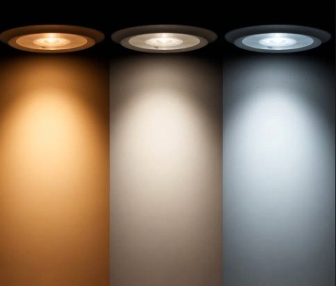 Three lights illuminating a wall to compare color temperatures: 3000K warm white, 4000K natural white, and 6000K cool white