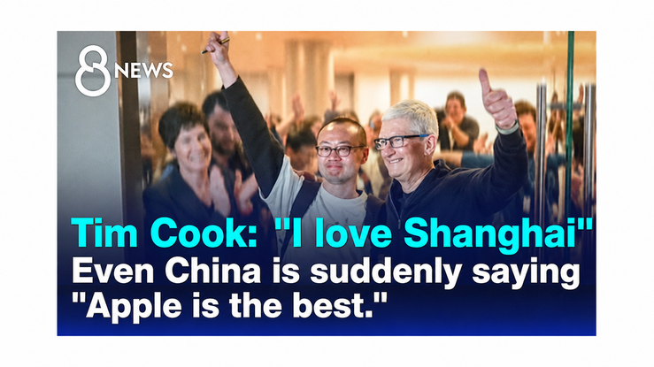 Apple CEO Tim Cook giving a thumbs up in the crowd while visiting Shanghai.