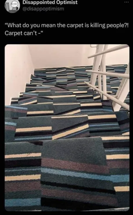 A tweet showing a staircase covered in mismatched, dizzying striped carpet tiles creating an optical illusion that hides step edges.