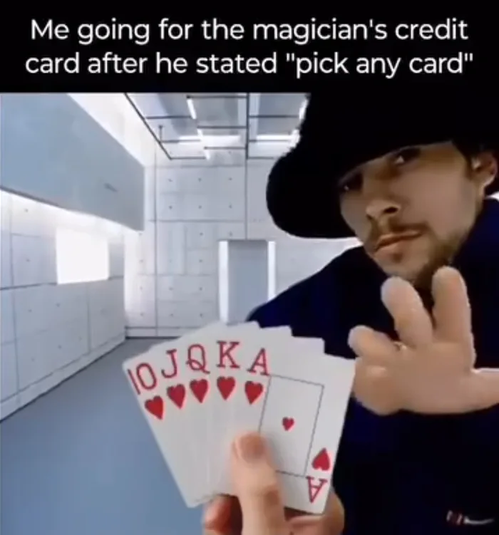 A meme featuring Jay Kay from Jamiroquai reaching out his hand toward playing cards with the caption: Me going for the magician's credit card after he stated 'pick any card'
