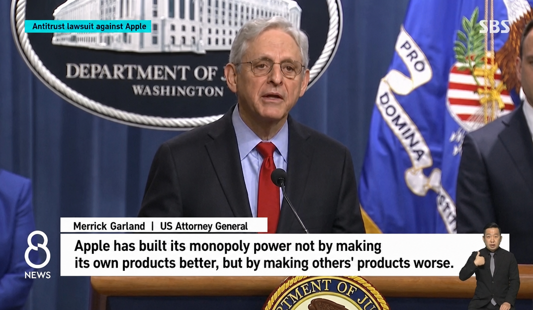 A news screen capture of US Attorney General Merrick Garland speaking at a press conference.