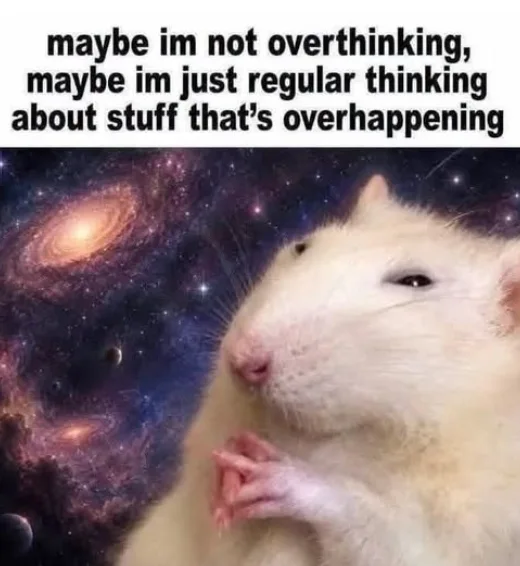 A close-up image of a white rat with its tiny hands folded near its chest, set against a swirling galaxy background, suggesting deep, philosophical contemplation.