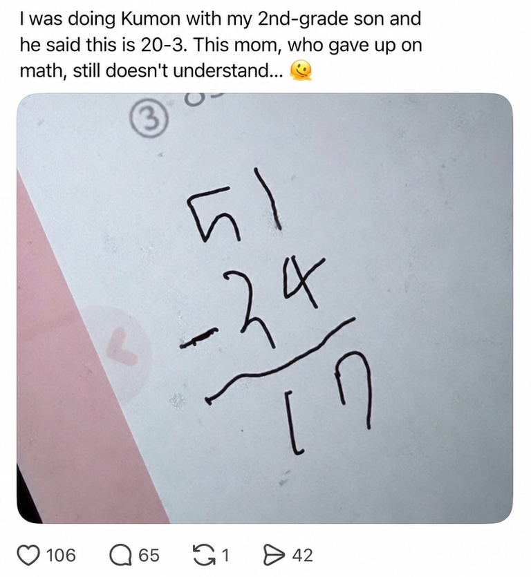 Photo of a workbook where a 2nd-grade elementary student explains 51-34 as 20-3