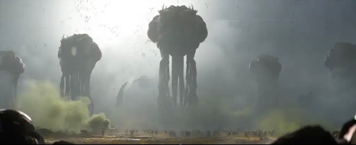 StarCraft Zerg concept art with a massive alien silhouette looming over a foggy battlefield.