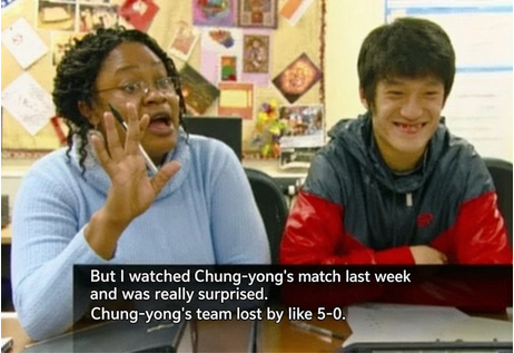 Viviana gesturing next to Lee Chung-yong while sharing the fact that his team suffered a crushing defeat in last week's match.