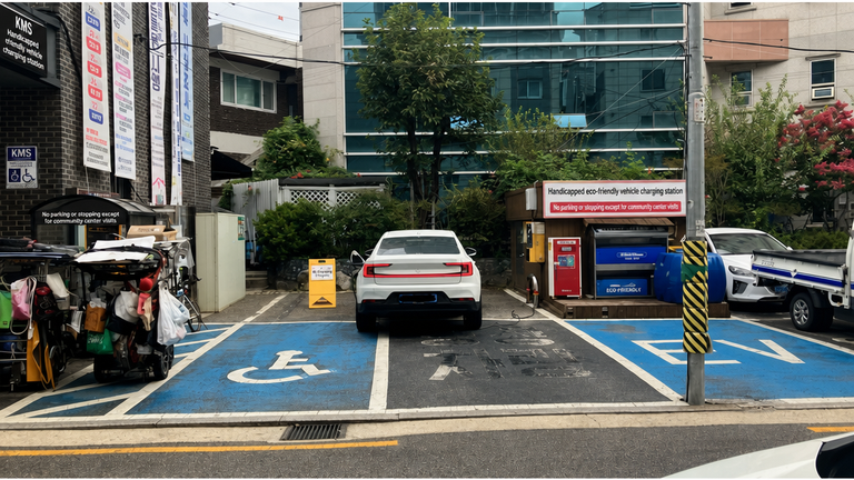 A wide view of the community center parking lot showing a white electric vehicle diagonally occupying handicapped and regular parking spots, with a charging line pulled over to it.