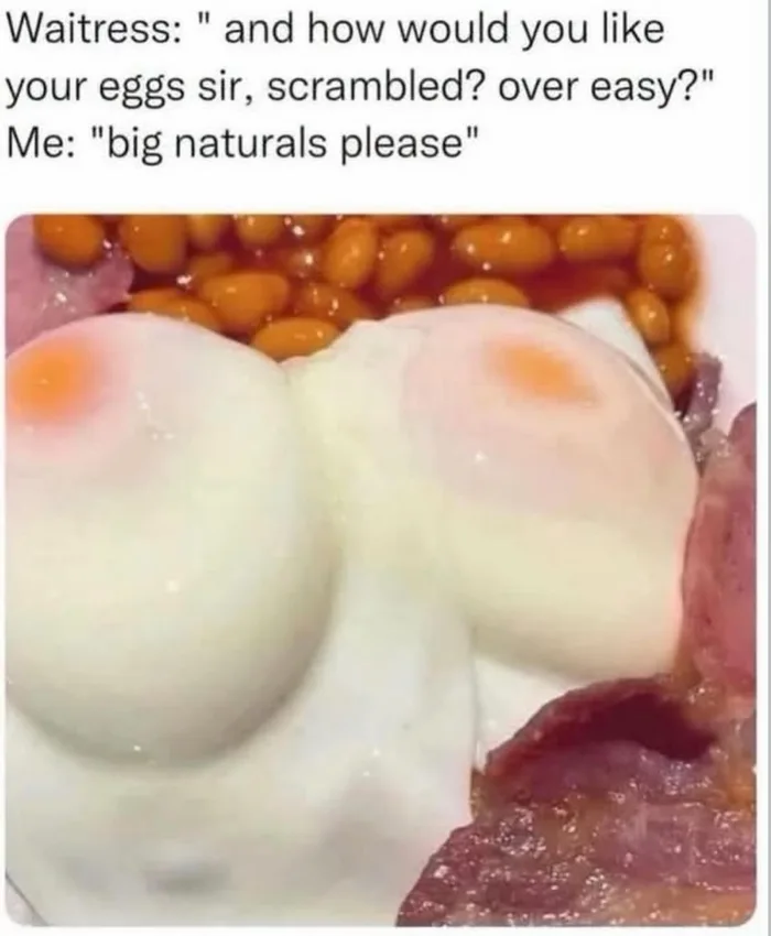 A plate with two poached eggs shaped remarkably like breasts served alongside baked beans and bacon, captioned with a joke dialogue ordering eggs as 'big naturals'.
