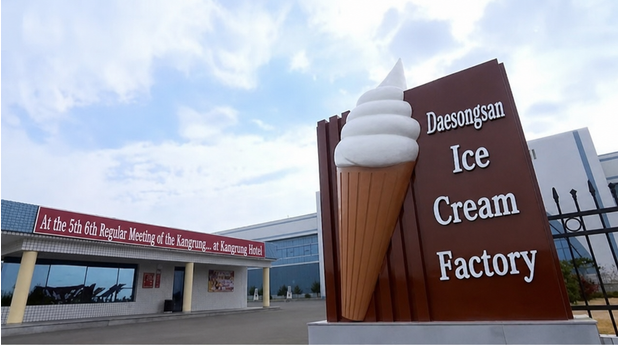 Signage for North Korea's 'Daesongsan Ice Cream Factory' and a giant soft-serve ice cream model sculpture