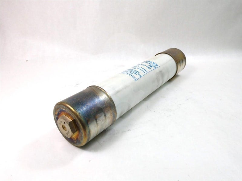 Industrial high-voltage fuse with a white ceramic cylinder body and metal caps on both ends