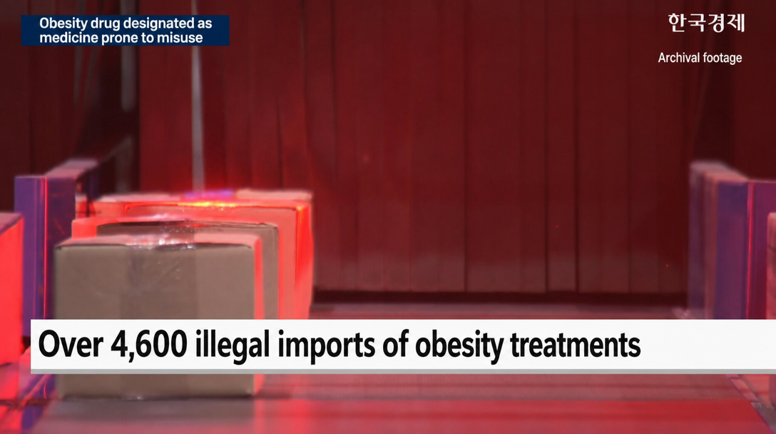 News graphic stating over 4,600 illegal imports of obesity drugs, with boxes moving on a conveyor belt.