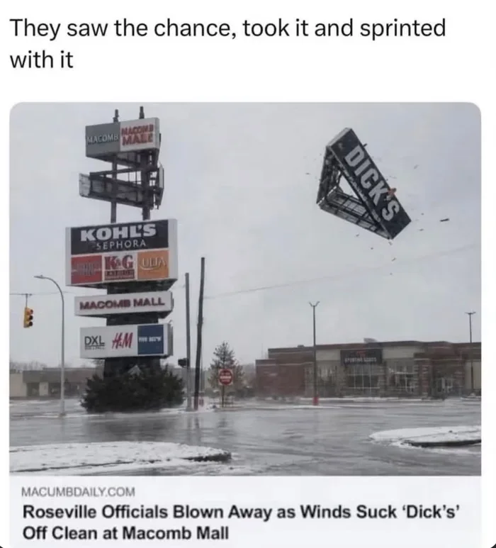 A roadside shopping center sign where the top 'DICK'S' logo section has blown off into mid-air, paired with a satirical news headline: 'Roseville Officials Blown Away as Winds Suck 'Dick's' Off Clean at Macomb Mall'.