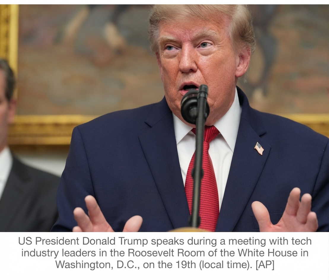 US President Donald Trump gesturing with his hands while speaking during a meeting in the Roosevelt Room at the White House