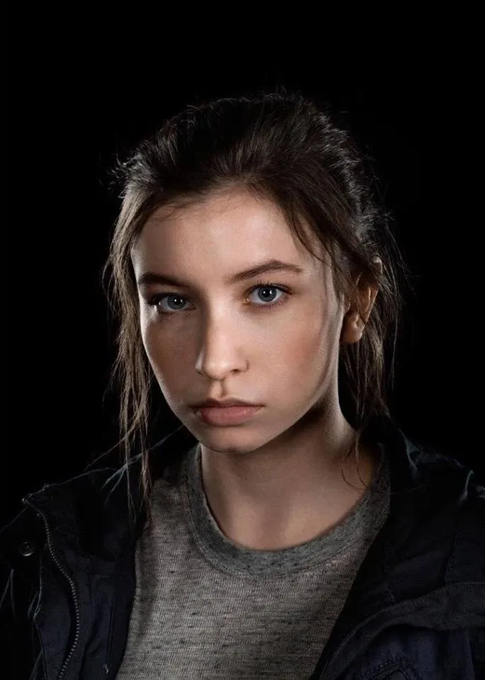 A close-up photo of Enid from The Walking Dead looking straight ahead