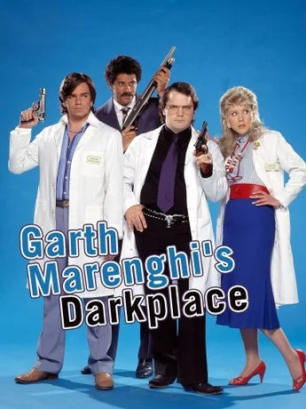 Promotional poster for the comedy series Garth Marenghi's Darkplace featuring the four main cast members posing with guns against a blue backdrop.