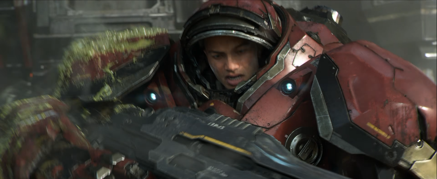 A Marine looking down at his Gauss rifle with a bewildered expression in a cinematic scene.