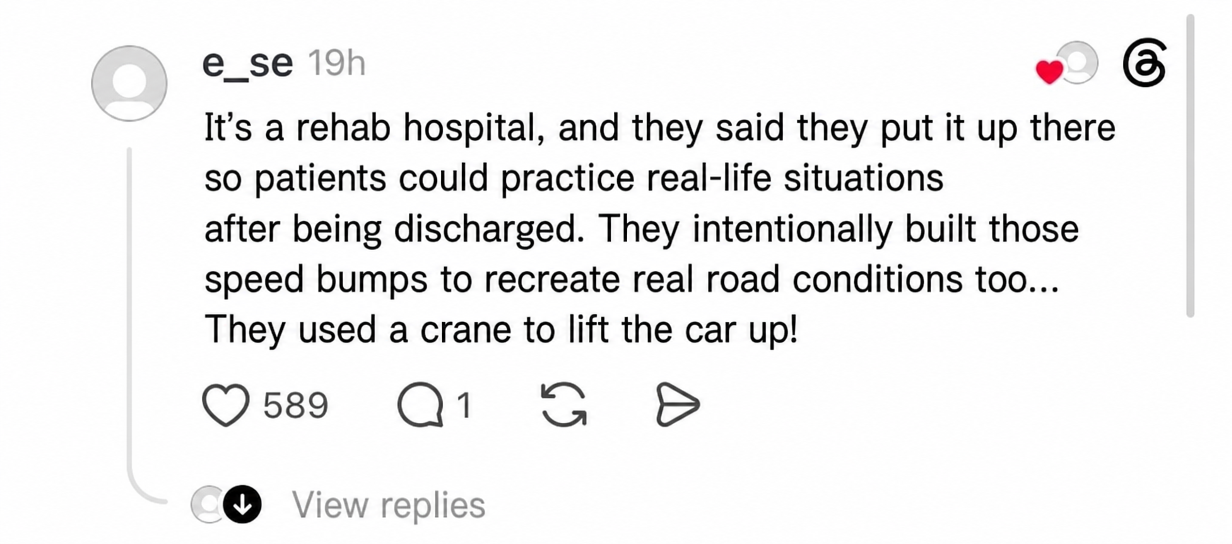 A screenshot of a comment explaining that the car was lifted by crane to help patients practice navigating speed bumps and prepare for real life after discharge.