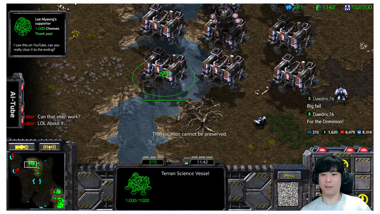 The flying Barracks crashing into and burning down the Zerg base defenses.