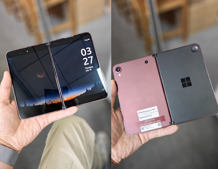 A Surface Duo device shown side by side with its screen turned on on the front and prototype stickers visible on the back