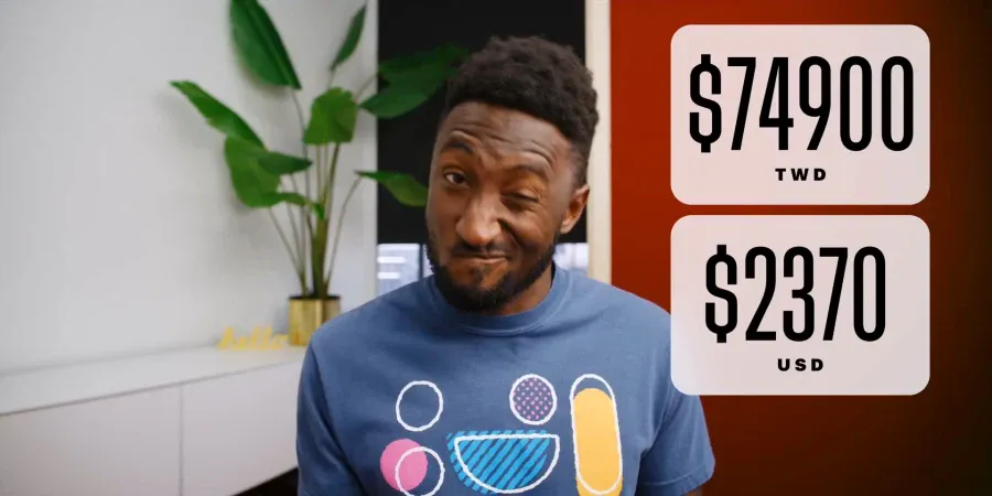 A YouTuber winking while showing a graphic of 74,900 New Taiwan dollars and its equivalent of 2,370 US dollars
